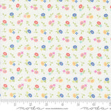 a white fabric with colorful flowers on it