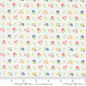 a white fabric with colorful flowers on it