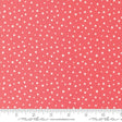 a ruler with a red background with white polka dots