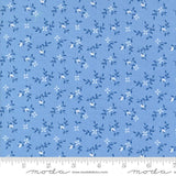 a blue fabric with white flowers on it