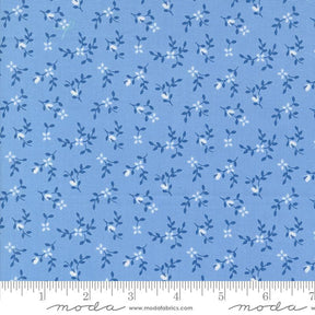 a blue fabric with white flowers on it