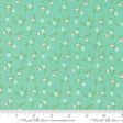 a green background with pink and white flowers