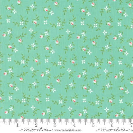 a green background with pink and white flowers