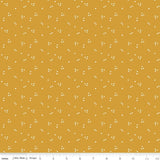 a yellow background with small white dots