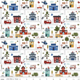 a pattern of houses and cars on a white background