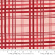 a red and white plaid fabric with a ruler