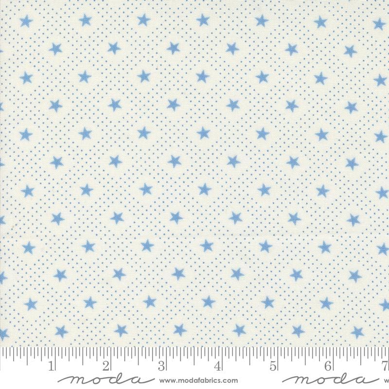 a ruler with a blue and white star pattern on it
