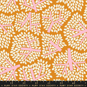 an orange and white pattern with white leaves