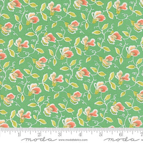 a green background with pink and yellow flowers
