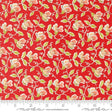 a red background with white flowers and green leaves