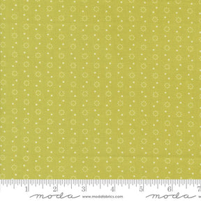 a ruler with a yellow background with white dots