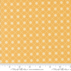 a ruler with a yellow background and white dots