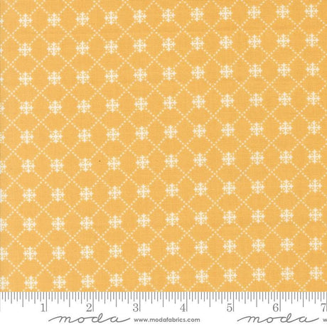 a ruler with a yellow background and white dots