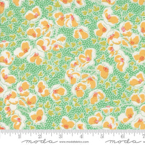 a green and yellow floral print fabric