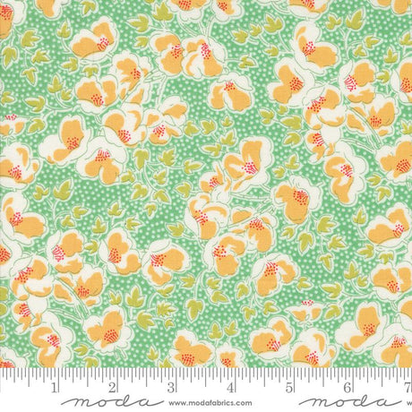 a green and yellow floral print fabric