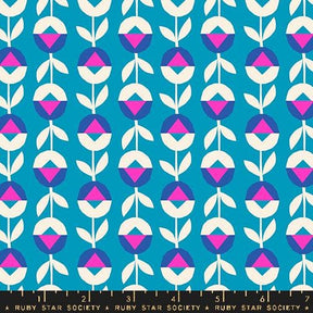 a blue background with pink and white leaves