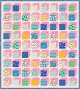 a pink and blue quilt with squares on it