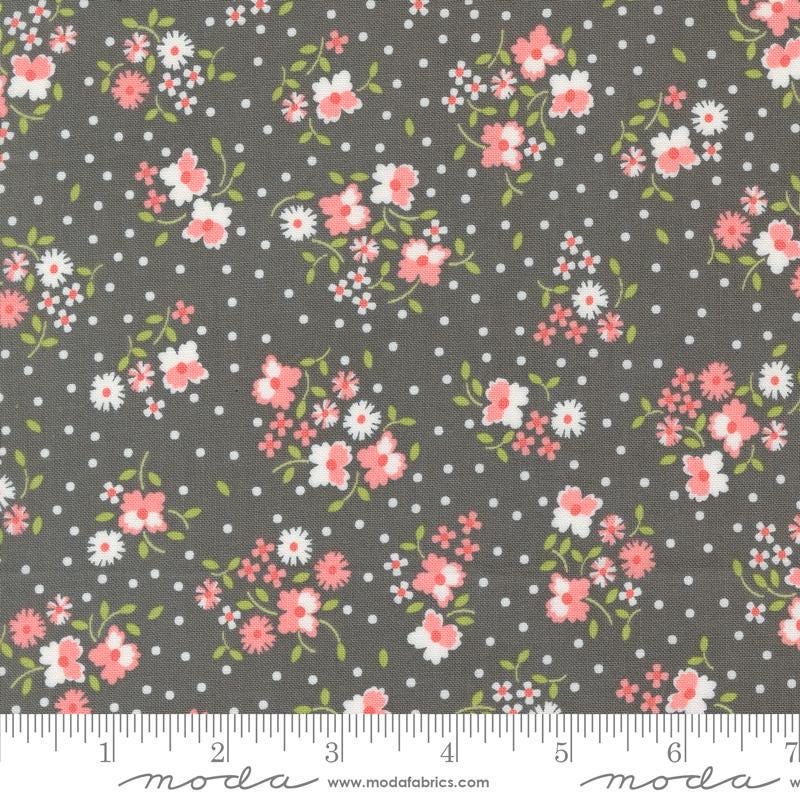 a gray background with pink and white flowers