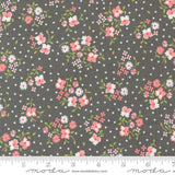 a gray background with pink and white flowers