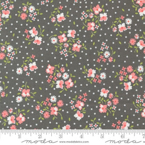 a gray background with pink and white flowers