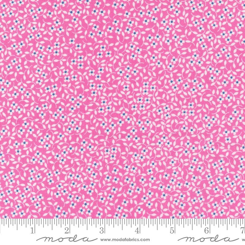 a pink background with blue and white dots