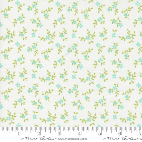 a white background with blue and green flowers
