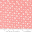 a pink background with white flowers on it