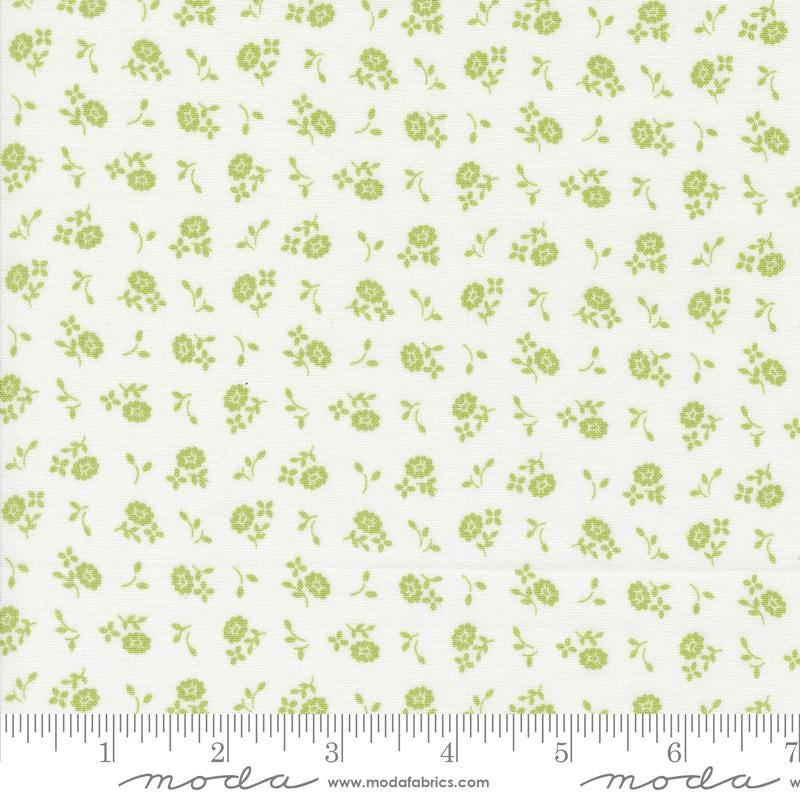 a white background with green flowers on it