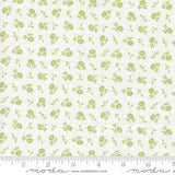 a white background with green flowers on it