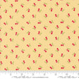 a yellow background with red cherries and green leaves