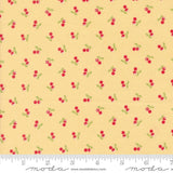 a yellow background with red cherries and green leaves