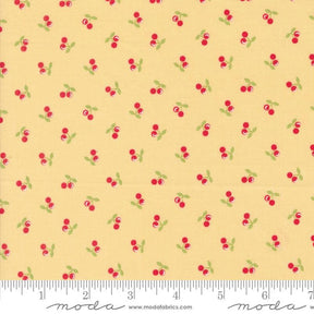 a yellow background with red cherries and green leaves
