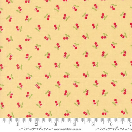 a yellow background with red cherries and green leaves