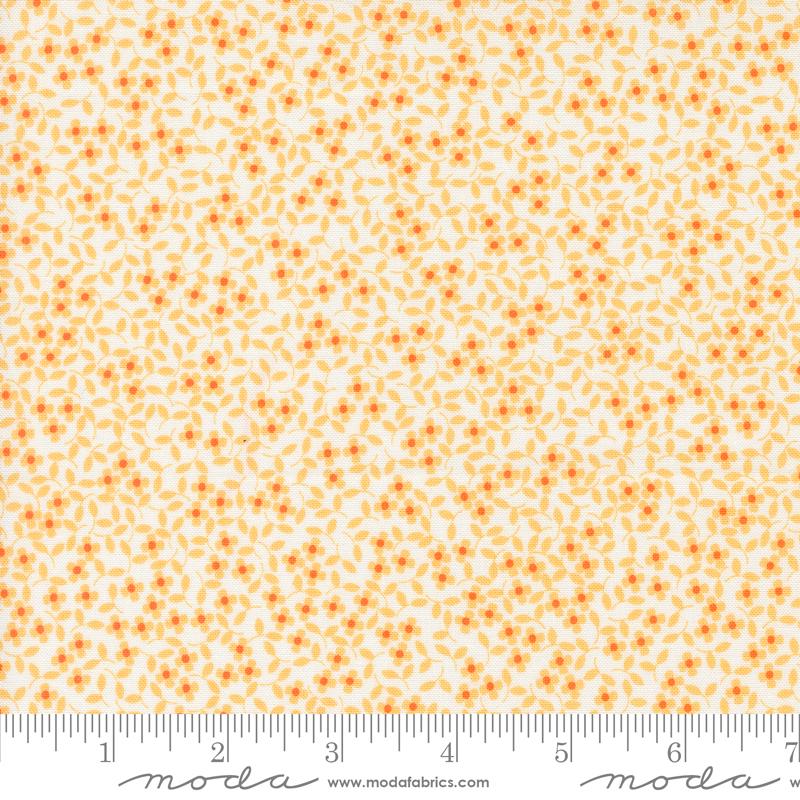 a yellow and white background with small orange flowers