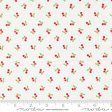 a white background with red cherries and green leaves