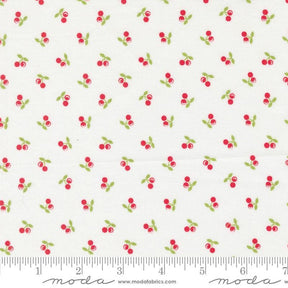 a white background with red cherries and green leaves
