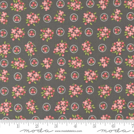 a gray background with pink flowers and circles