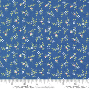 a blue fabric with small flowers on it