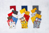 a bunch of different types of fabric on a white surface