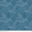 a blue and white pattern with a ruler in front of it