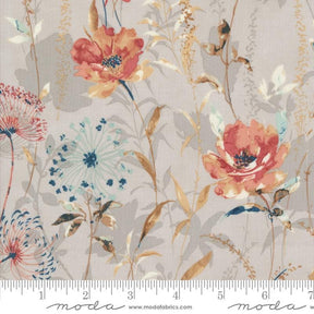 a floral print fabric with a ruler in front of it