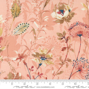 a pink floral print fabric with a ruler in front of it