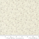 a white fabric with small flowers on it
