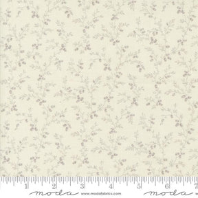 a white fabric with small flowers on it