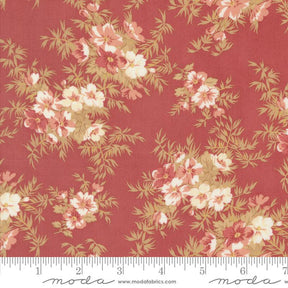 a red flowered fabric with white and pink flowers