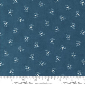 a blue fabric with white flowers on it