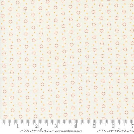 a ruler with a white background with orange dots