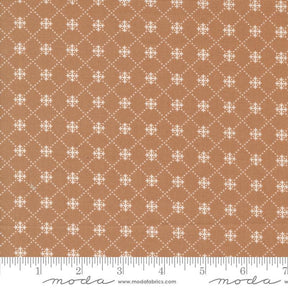 a ruler with a brown and white pattern on it