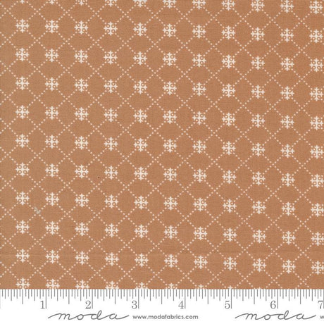 a ruler with a brown and white pattern on it