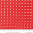 a red fabric with white crosses on it